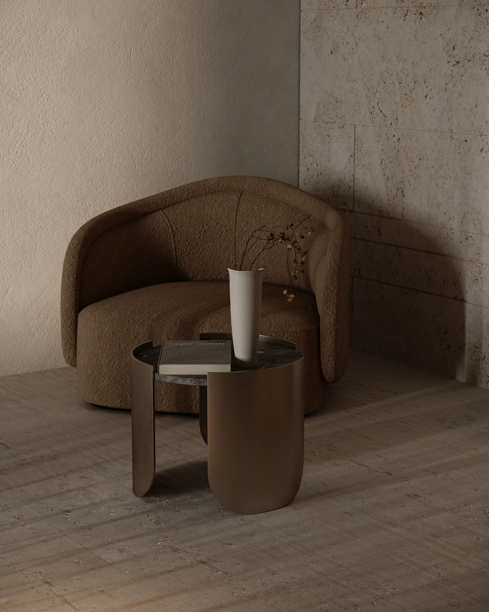 A bouclé armchair and bronze side table against travertine