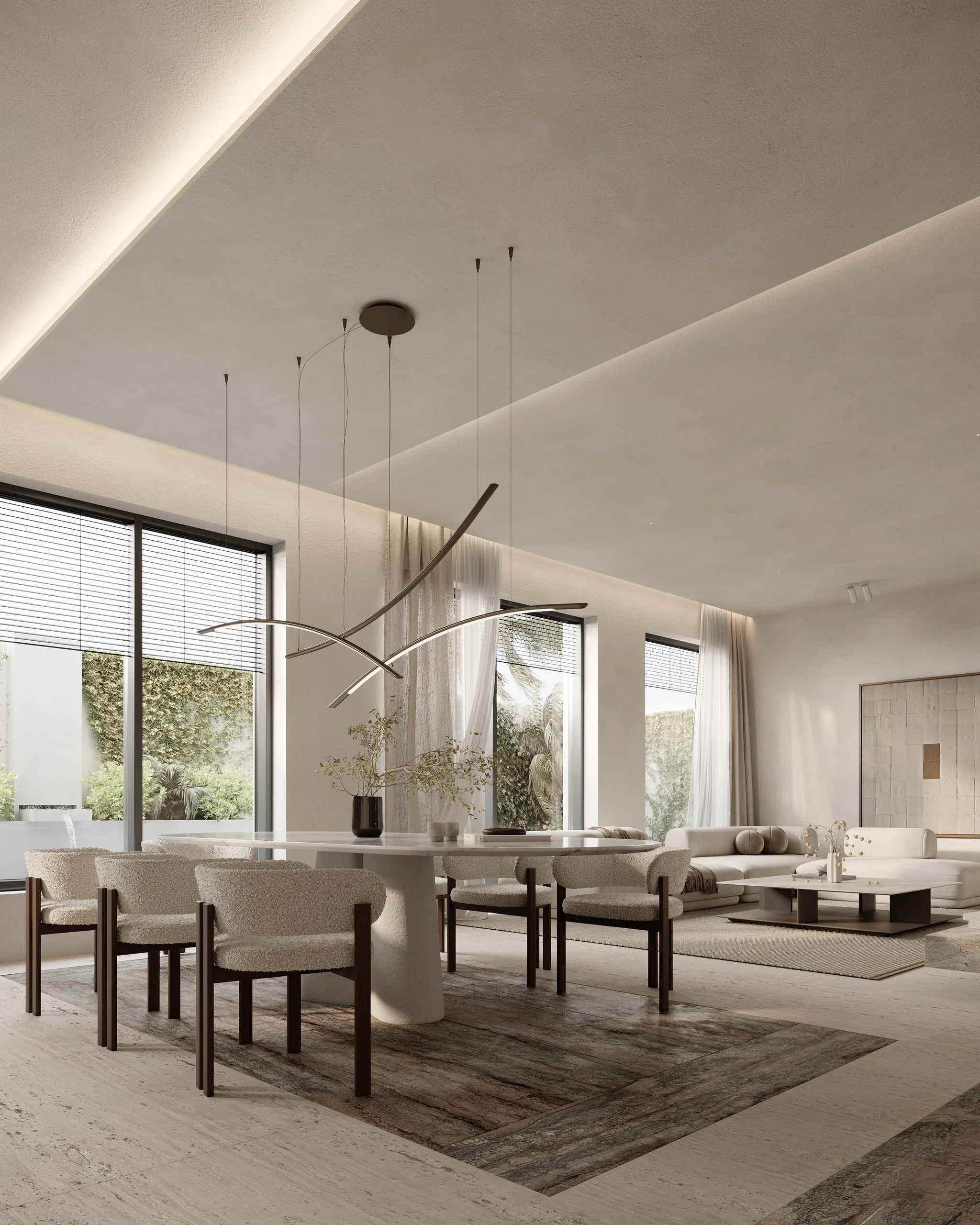 Dining room under a sculptural pendant